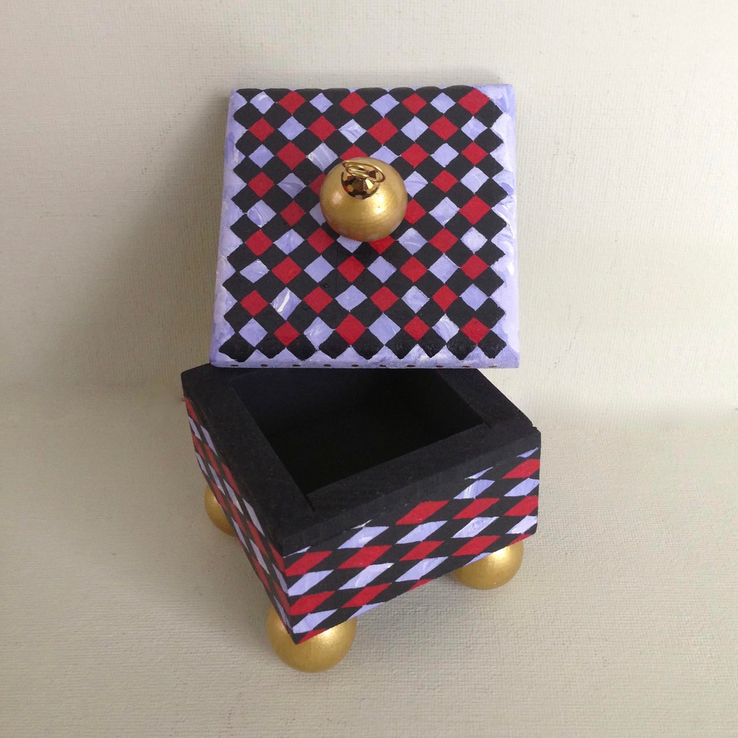 Monkey decorative handmade wooden box showing lid and interior.