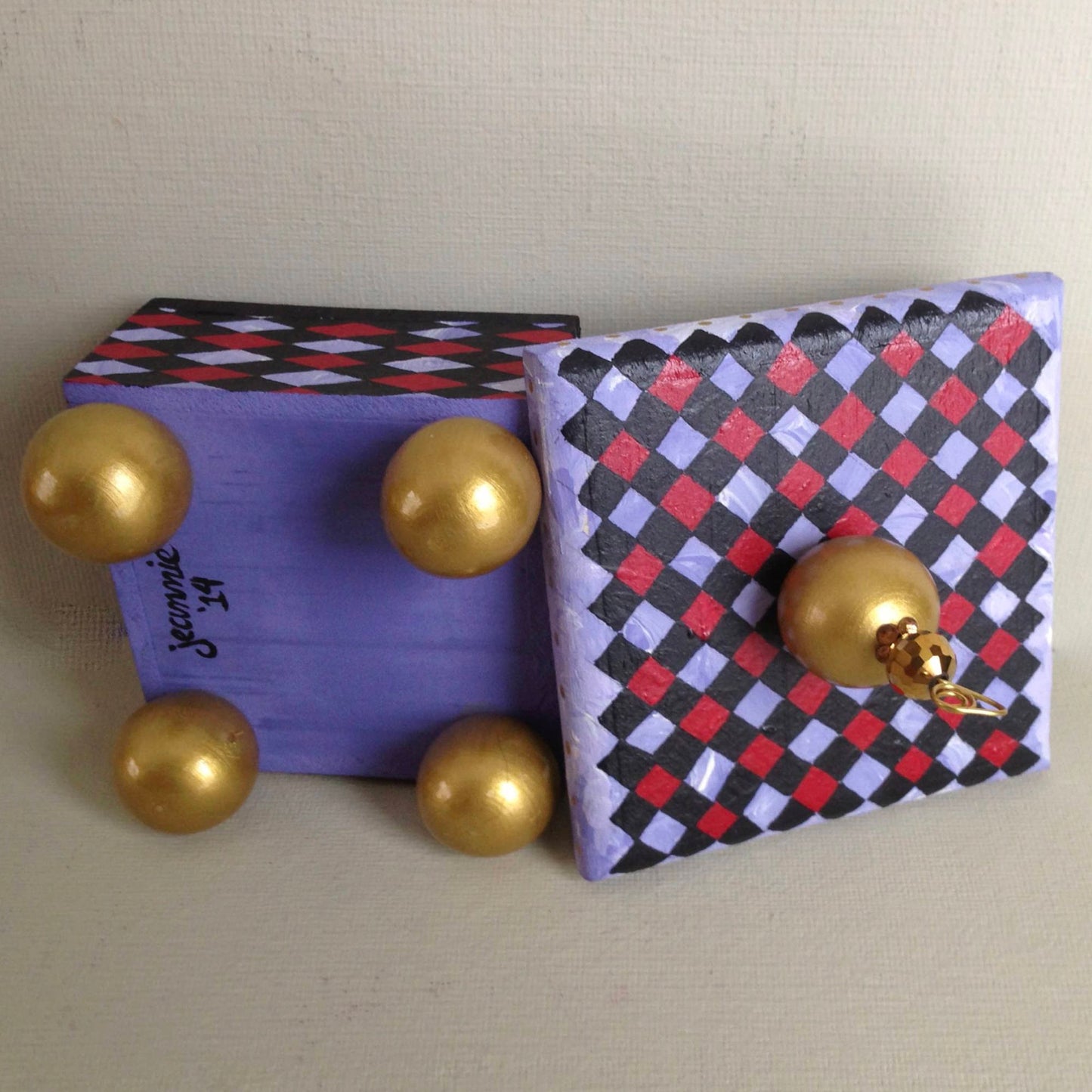Monkey decorative handmade wooden box showing bottom and lid.