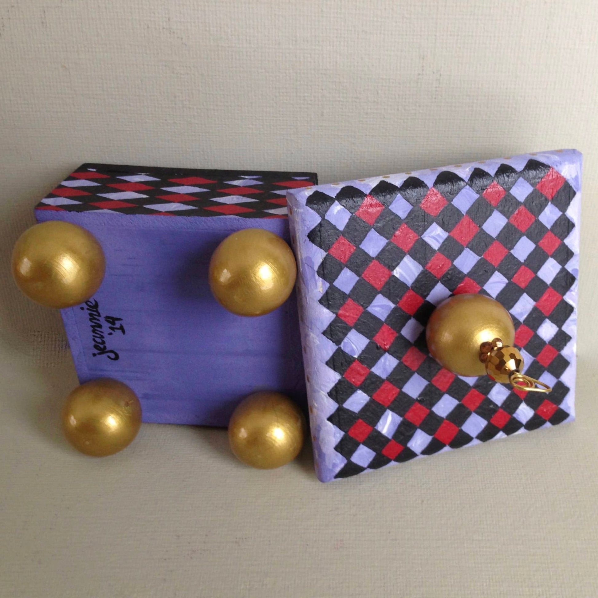 Monkey decorative handmade wooden box showing bottom and lid.