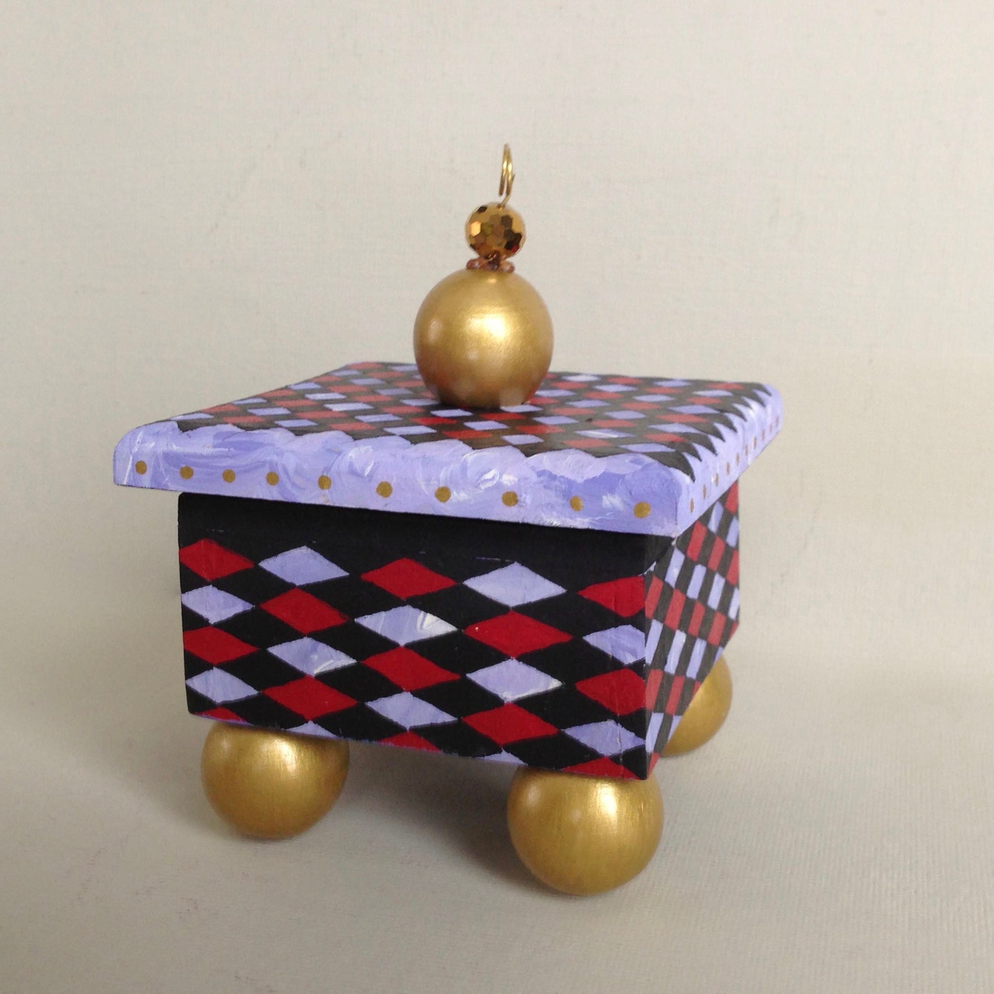 Monkey decorative handmade wooden box with diamond details.